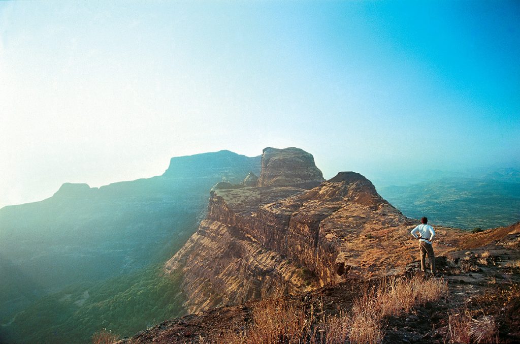 The sun-kissed view of the Western Ghats from Alang Fort