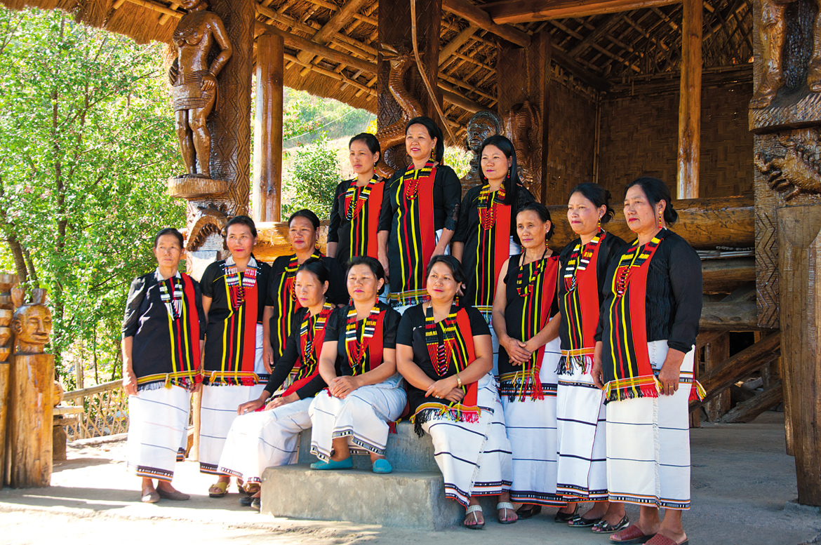 Performers pose for a photo-op at their morung