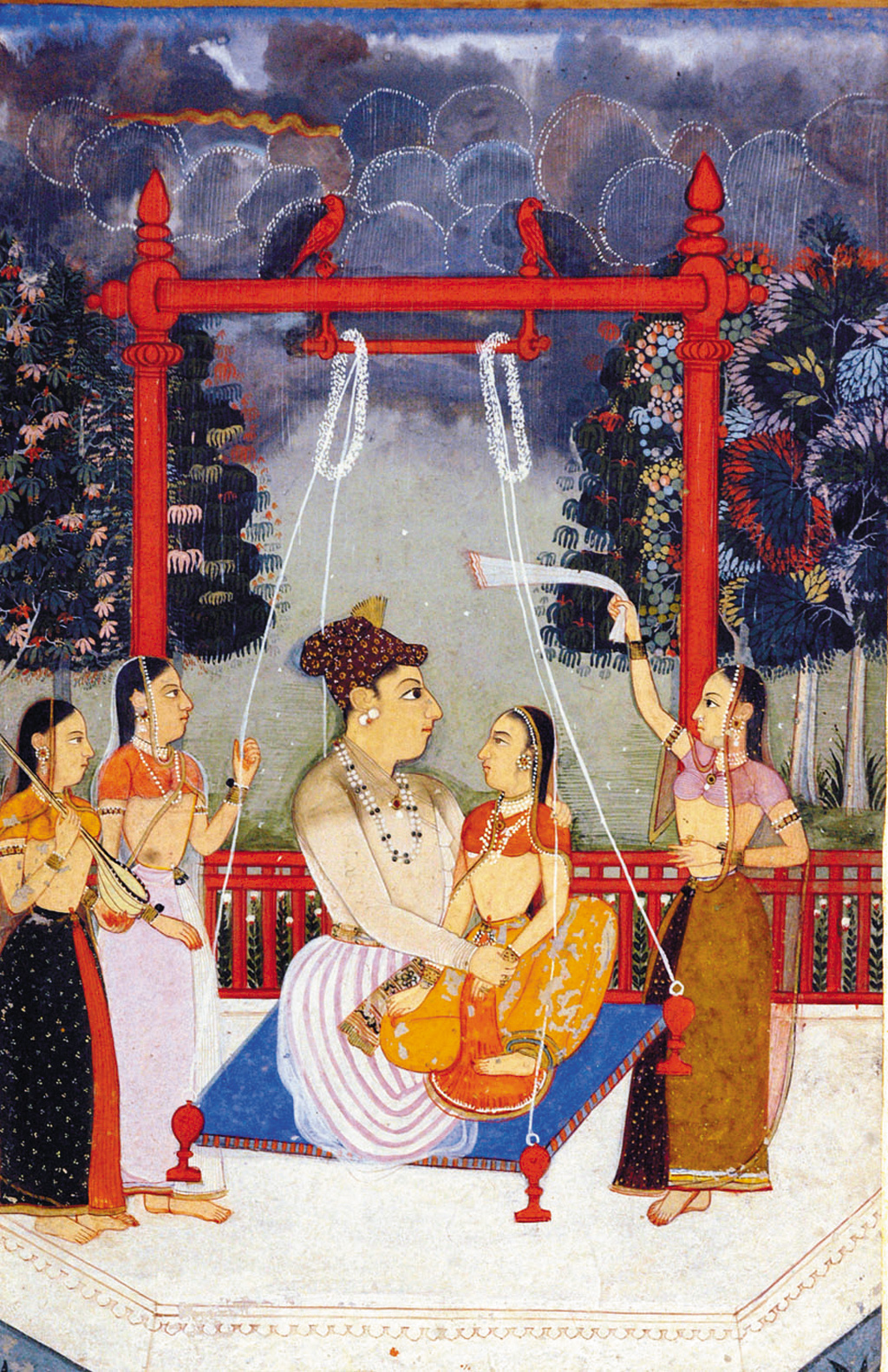 One of the stunning characteristics of Deccani paintings was its palette dominated by blue, pink and mauve. This painting, done in Raga Hindola, beautifully captures the romance of the moment, Deccan 1710