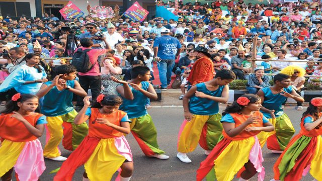 Dancers clad in colourful costumes participate in the carnival