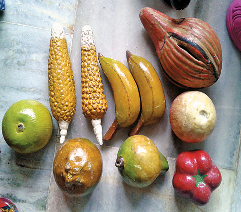 Wooden fruits made by artisans in Nirmal