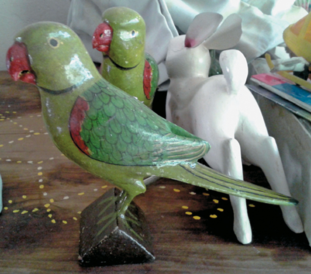 Wooden birds made by artisans in Nirmal