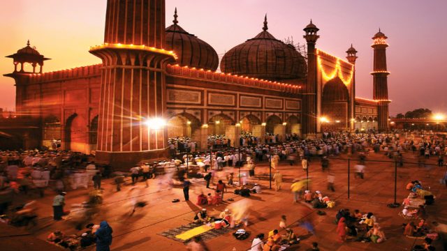 The faithful gather at the Jama Masjid to pray