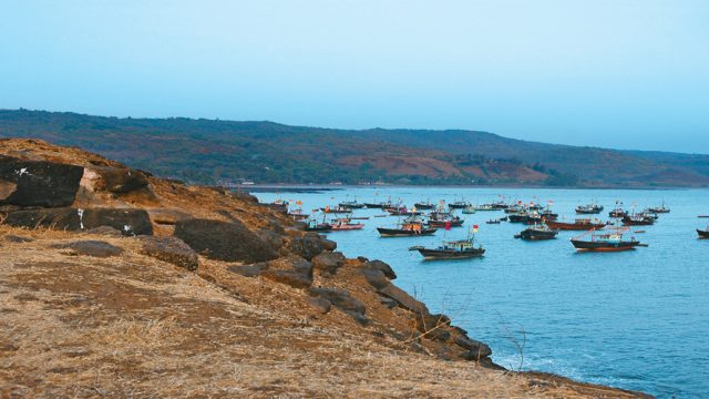 Fishing vessels anchored off Harnai Beach