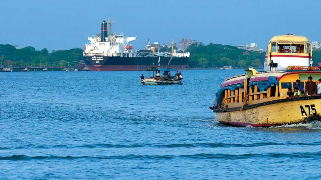 Commercial and tourist boats in the waters off Kochi