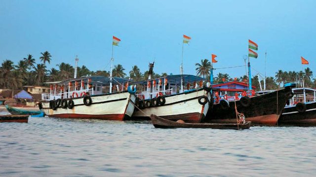 Fishing vessels anchored near the shore, Malvan