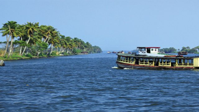 Canal cruise in Travancore, on a clear day