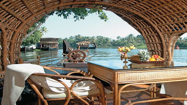 Scenic view from a houseboat, a popular way to experience the backwaters