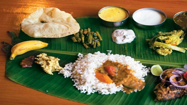 A traditional meal served on a plantain leaf