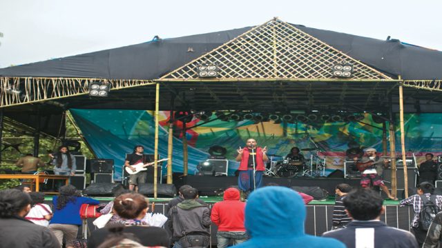 A band performs on stage at the Ziro Festival of Music