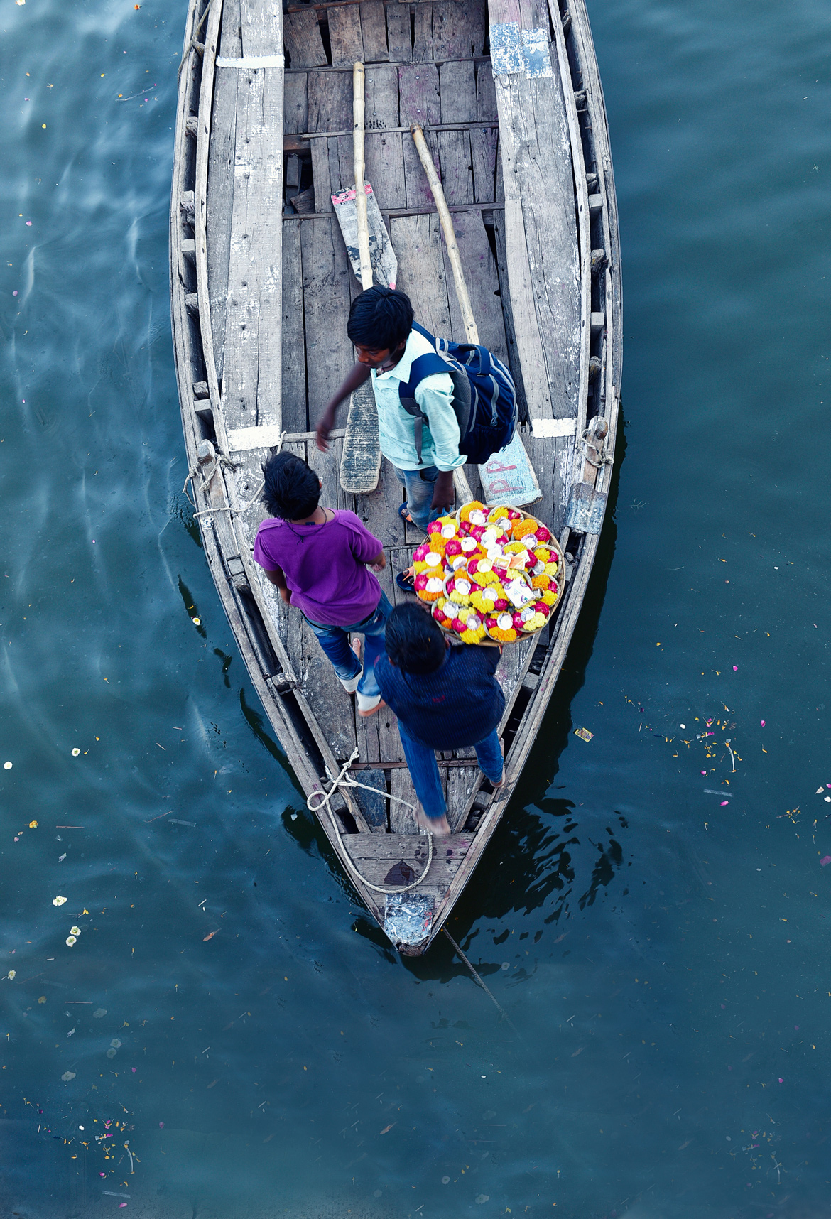 Young flower vendors prepare for a long and busy day