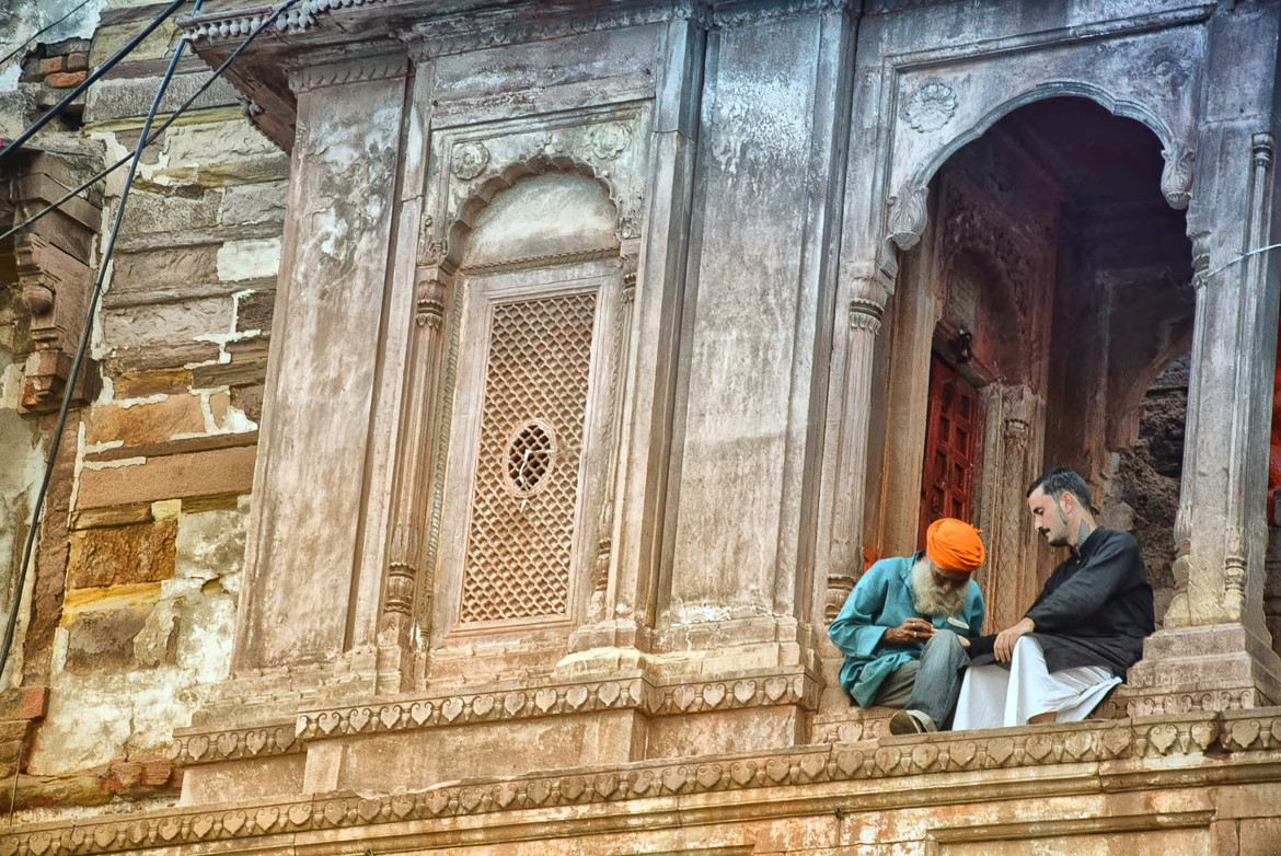 Benaras has many palm-readers and horoscope tellers. One such gentleman concentrates hard on telling the future