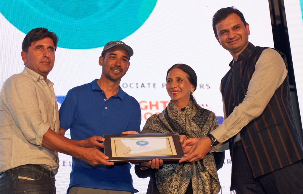 Avilash Bisht and Sanjeev Ganju, Directors, receive the Jury award for Best Adventure Tour Operator for White Magic Adventure Travel