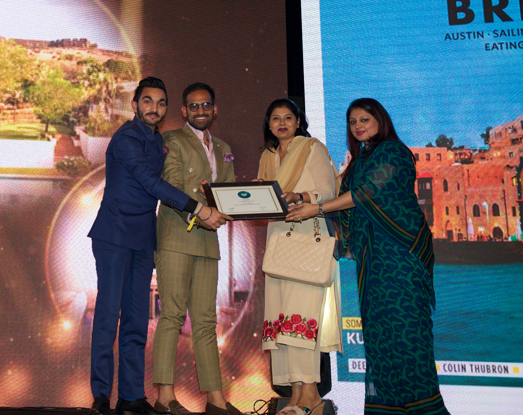 Arjun Verma, Director of Marketing & Communications and Rohan Bhasin, Director of Sales, receive the Jury award for Best Luxury Beach Resort for W Goa