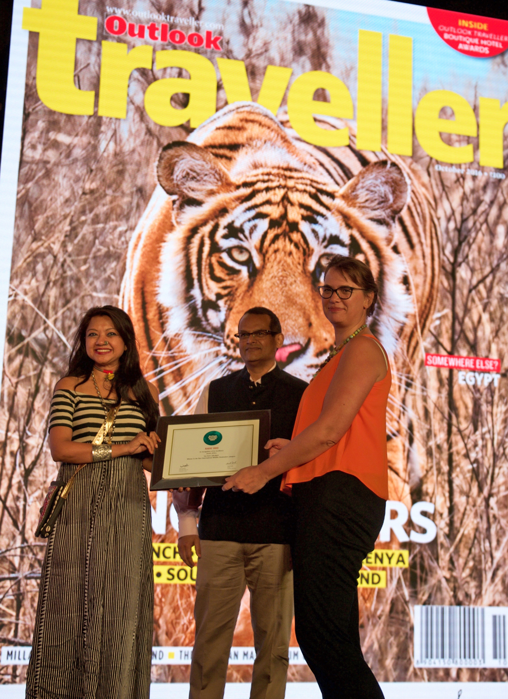 Hanneli Slabber, Country Head, receives the Readers’ Choice award for Best International Wildlife Destination for South Africa
