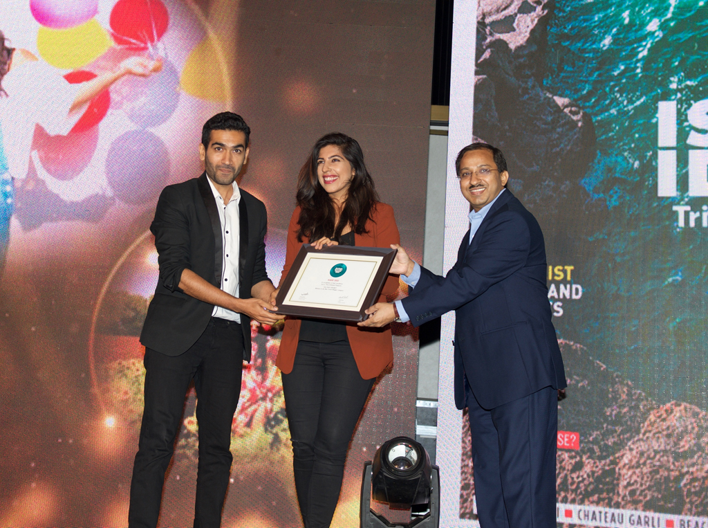 Savi & Vid, co-founders, Bruised Passports, receive the Readers’ Choice award for Best Travel Blogger for Bruised Passports