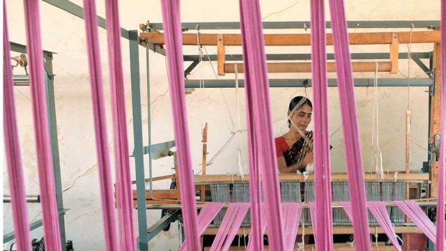 A weaver making a Pochampally sari, Nalgonda District