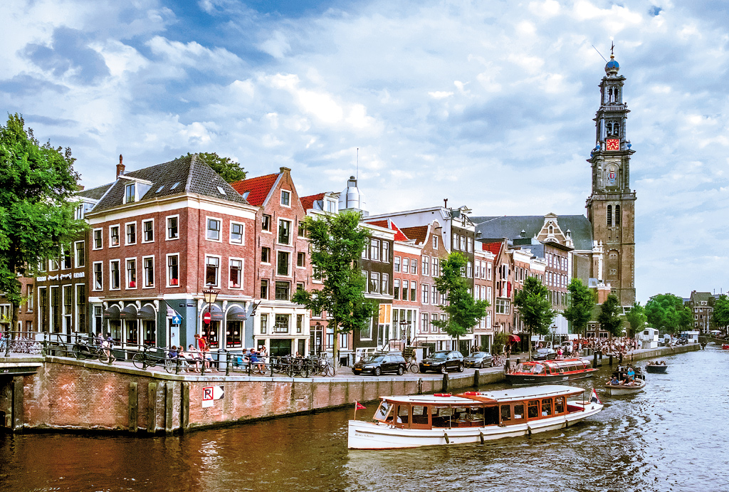 The canals of Amsterdam, Netherlands. The Grachtengordel, or the concentric circles formed by the original moat and three main canals of Amsterdam, are the keystone of its exemplary city planning.