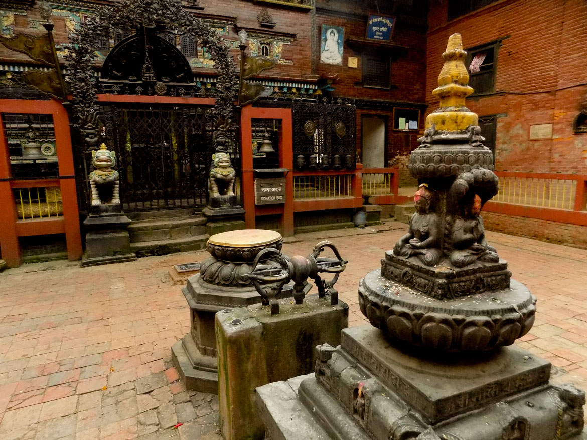 An intricately carved chaitya representing the Pancha Tathagata or the 5 Buddhas at Guji Baha or the Vaishravana Mahavihar. They form the cornerstone of Vajrayana practice in the valley. The other two ever-present structures in a monastic courtyard is the vajra and the the three-dimensional Vajradhatu Mandala, as you can see here