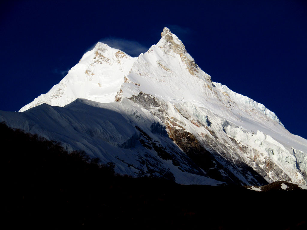 The village of Samagaon, a large Khampa Tibetan settlement sits right under Manaslu, ensuring that you get views like this