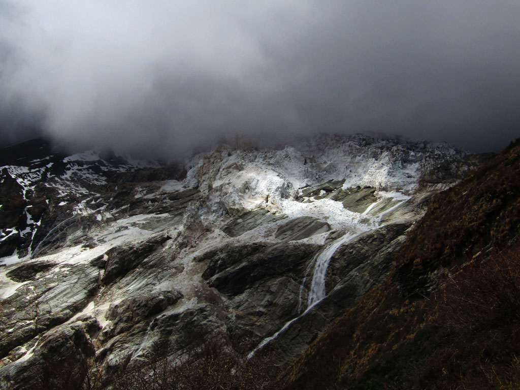 A waterfall on the tangled icefall of the lower Manaslu Glacier. The roar of giant seracs crashing is a constant companion on the trail to the Base Camp