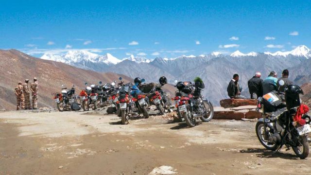 Bikers taking a break at Khardung La, one of the highest motorable passes