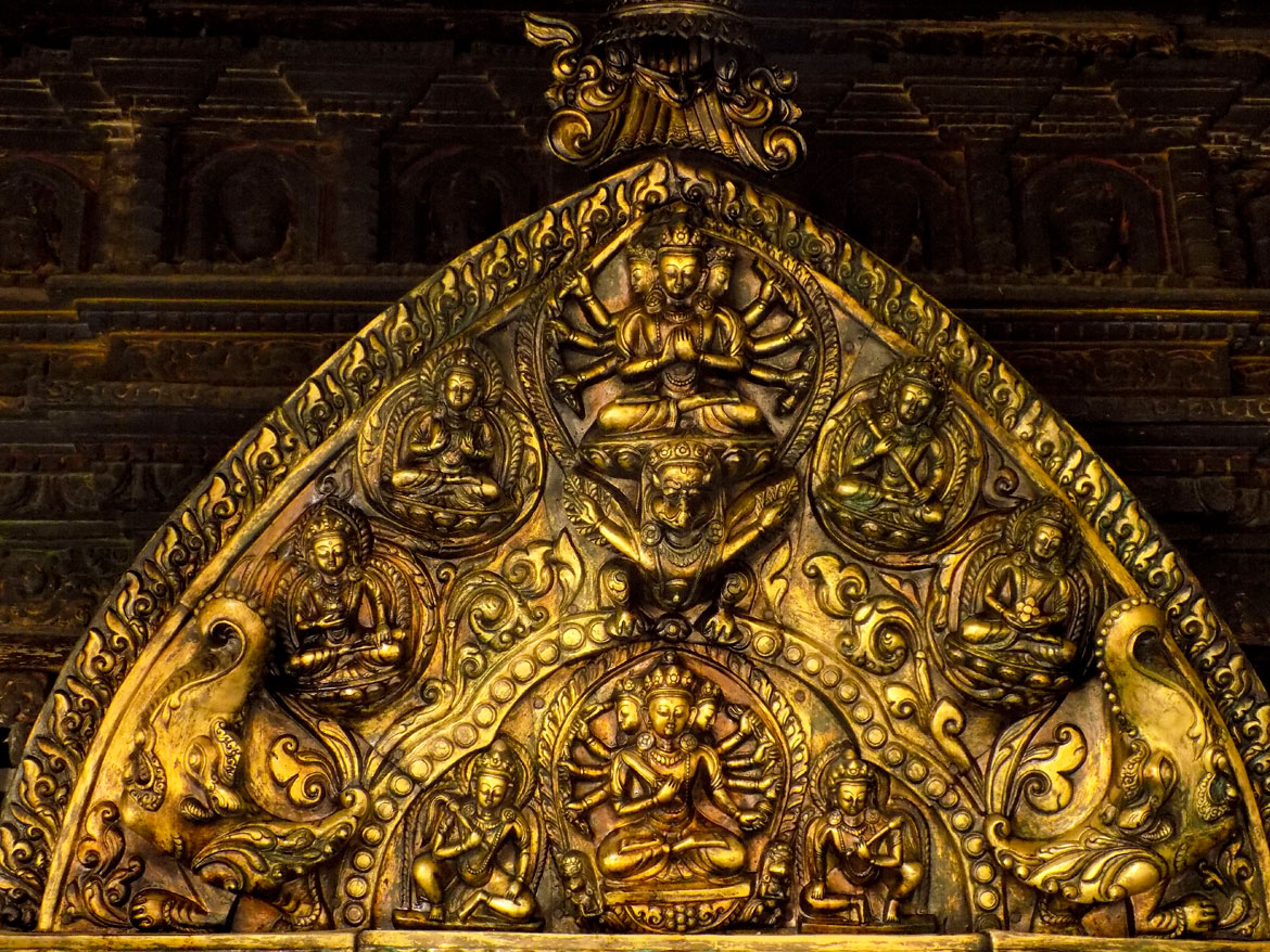 The Newars are masters of repoussé work, especially when working with gold. This gorgeous artwork at the top of one of the toranas or doors of the Swayambhu chaitya is proof of their mastery