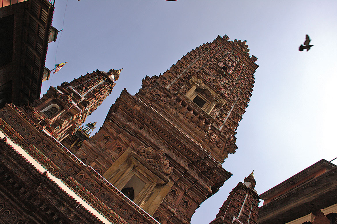 Not all sacred courtyards house a monastery, however. Take the Mahabaudha for example. This magnificent brick temple was built in 1564 by Abhaya Raj Sakya, and it's modelled on the Mahabodhi Temple in Bodh Gaya, which Abhaya Raj had visitied on pilgrimage.