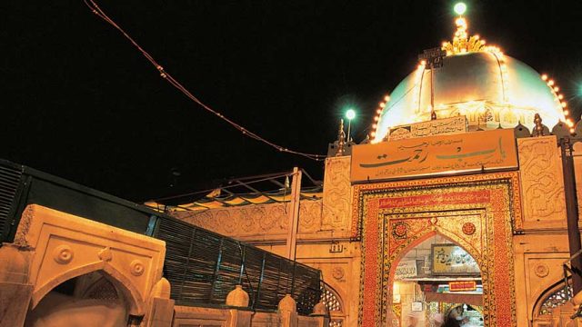 The illuminated entrance to the Dargah Sharif