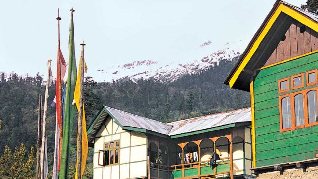 Colourful houses on stilts, Lachung Valley