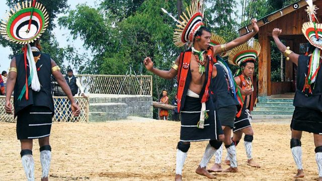 Members of a Naga tribe performing a traditional dance