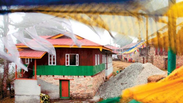 Colourful prayer flags fluttering in the breeze at Pelling