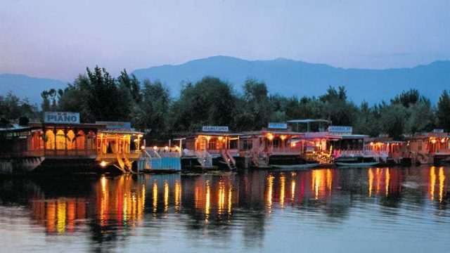 Lights from houseboats reflected on the surface of the Dal Lake