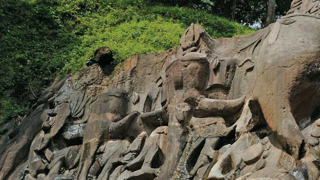 Impressive rock-cut sculptures carved out from a hillside