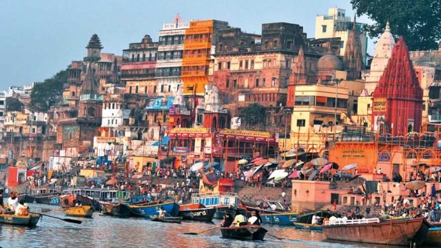 Pilgrims and visitors throng the ghats of Varanasi