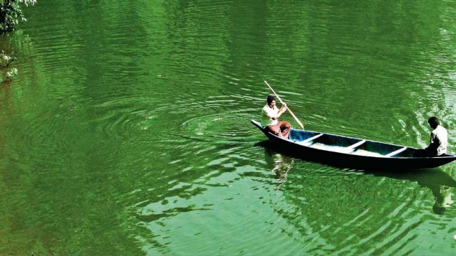 A boat on the serene waters of Ganga Lake