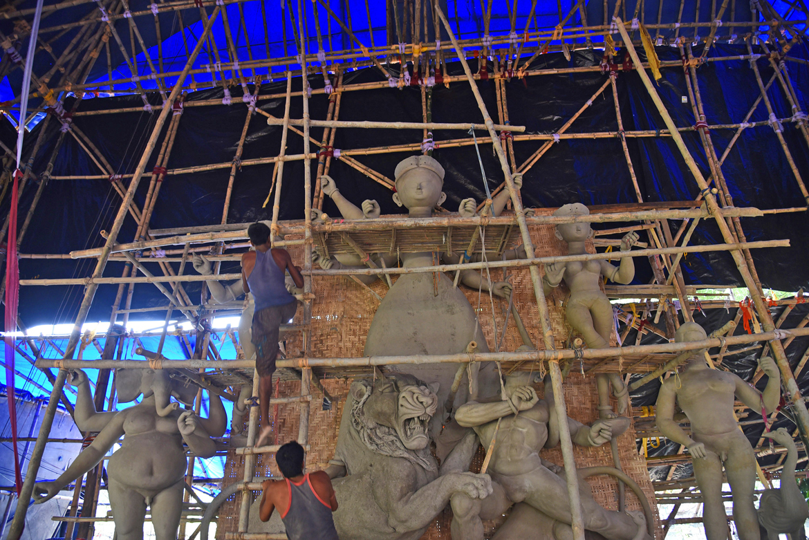 Artisans are racing against time to finish the pandals