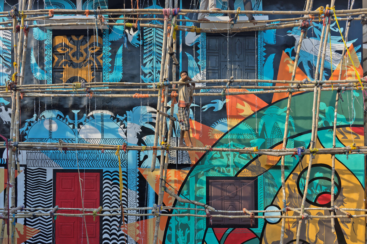 Pretty murals make for pretty pictures in the backdrop of Durga Puja preparations