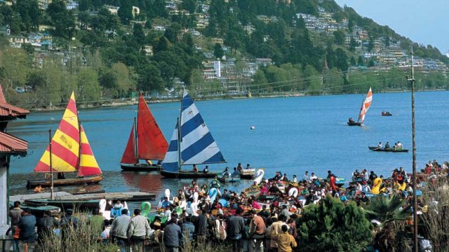 Sailing on the Naini Lake, a popular activity with tourists