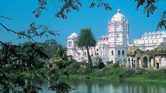 The Ujjayanta Palace set amidst verduous Mughal-style gardens