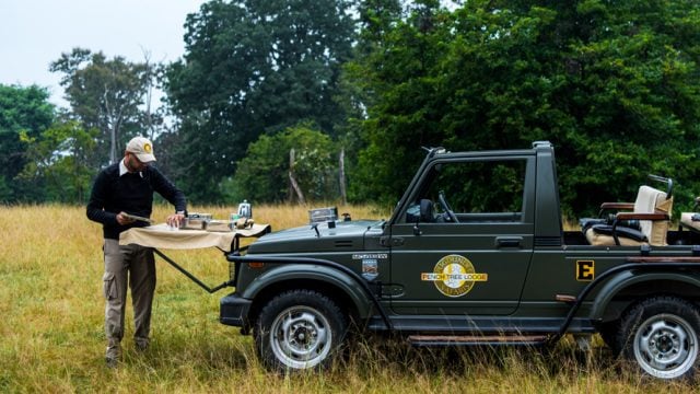 Gaurav Dhotre, a naturalist with Pugdundee Safaris setting up breakfast in the middle of Pench National Park.