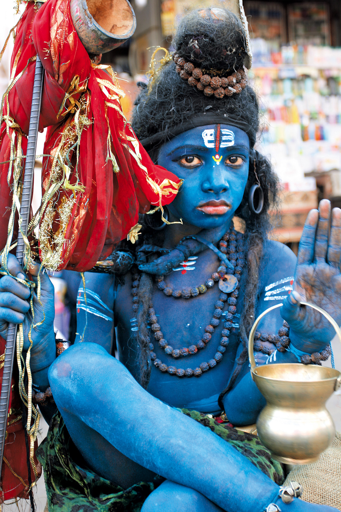 A boy dressed up as Lord Shiva