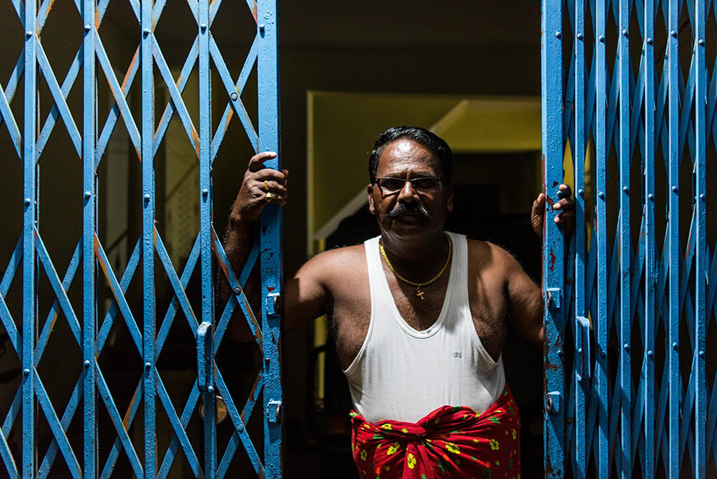 Kuttappan stands outside his house at Tala village in Bandhavgarh National Park