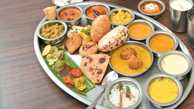 The multiple elements of a Gujarati thali