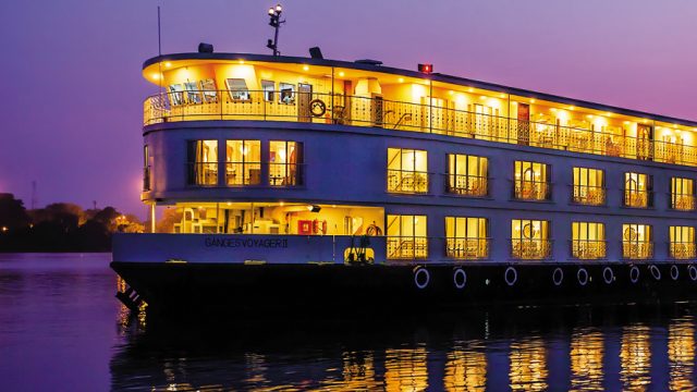 The Ganges Voyager cruise ship leaves the Botanical Garden Jetty