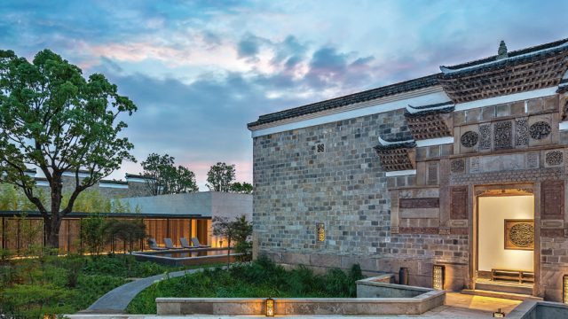 The stunning exterior of an antique villa at Amanyangyun