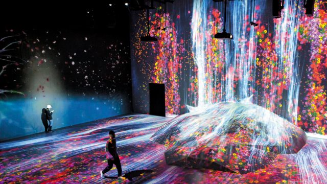 A simulation of a waterfall that plunges into a floral universe