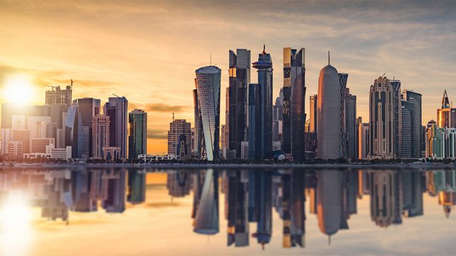 Doha's skyline by sunset