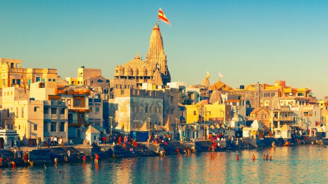 The Dwarkadhish Temple is located in the heart of Dwarka city and is a population location