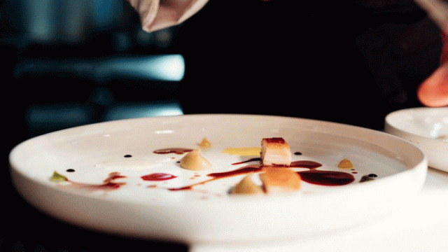 Final touches being put to a dish at Osteria Francescana in Italy